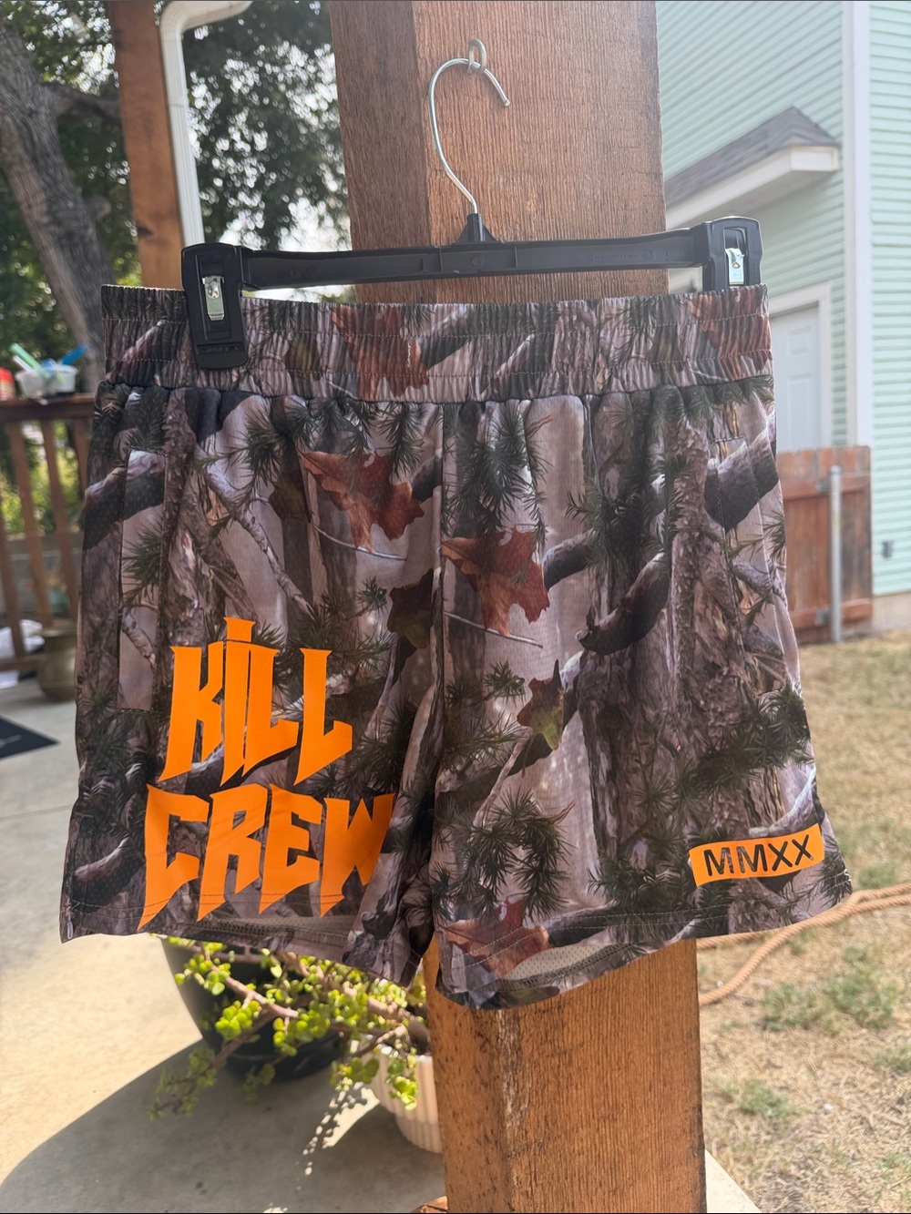 Kill Crew Camo Shorts with Bright Orange Logo